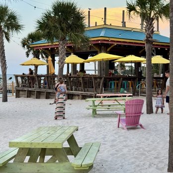LuLu's Destin - Outdoor play area for the little kids in the foreground and big kids play area in the background! - Seafood Near Me - Destin, Florida