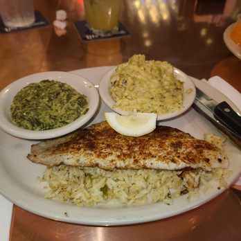 Pappy's Cafe - Kickin blackened catfish over Gruene rice, broccoli rice casserole, creamed spinach. - American Near Me - Houston, Texas Pappy's Cafe - Kickin blackened catfish over Gruene rice, broccoli rice casserole, creamed spinach. - American Near Me - Houston, Texas