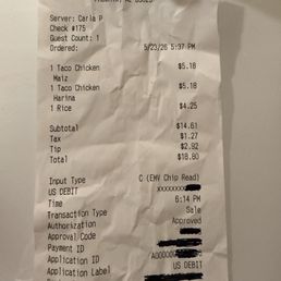 As you can see the menu says the taco cost $4.50 but I was charged $5.18 per taco. The rice also was increased in price.
