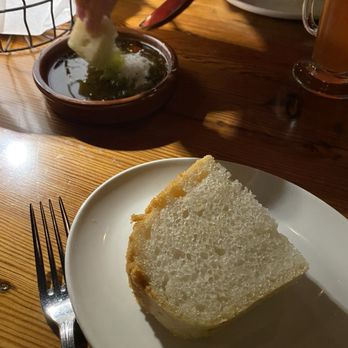 Capo Restaurant - Gluten free bread with light flavorful olive oil to dip. - Bars Near Me - Boston, Massachusetts