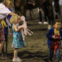 Flintridge Riding Club - Handing out the Ribons