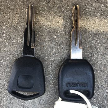 Low Price Keys - Original Isuzu key next to my new emergency duplicate! - Keys & Locksmiths Near Me