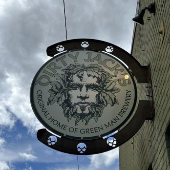 Green Man Brewery - a circular sign with a lion on it - Breweries Near Me - Asheville, North Carolina