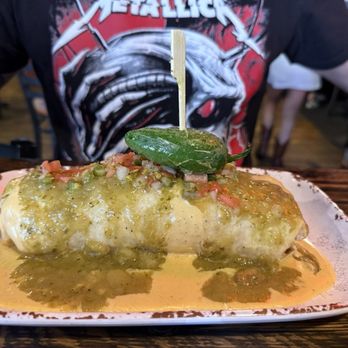 Stoney's Bar and Grill - Breakfast burrito. Very flavorful, had some heat. Husband devoured. - American Near Me - Denver, Colorado Stoney's Bar and Grill - Breakfast burrito. Very flavorful, had some heat. Husband devoured. - American Near Me - Denver, Colorado