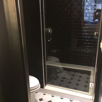 Room Mate Grace Hotel - Large shower in bathroom. Pocket door. - Hotels Near Me - New York, New York Room Mate Grace Hotel - Large shower in bathroom. Pocket door. - Hotels Near Me - New York, New York
