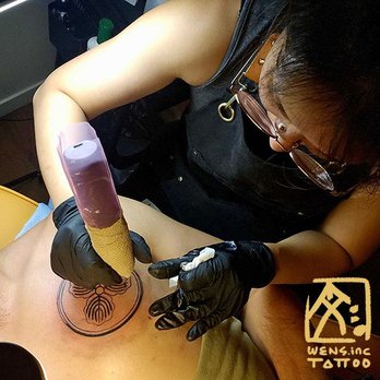 Wen's Tattoos - Three oaks leaves in a circle family crest (Maruni Mitsu Kashiwa Kamon) tattoo, done by artist Wens Inc Tattoo. - Tattoo Near Me