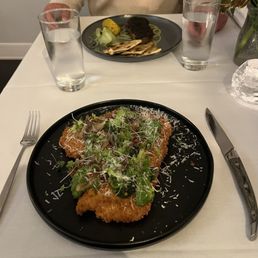 In the distance is a duck dish, up close is a pork dish. Both are delicious!