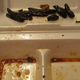 too much grease!  & who can eat 9 chili peppers? & hairy spring onion caps?