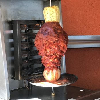 Taco Bar - Al Pastor grill at Taco Bar at the Villa Del Palmar Beach Resort in Cabo San Lucas. - Tacos Near Me - Cabo San Lucas, BCS
