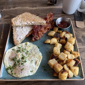 First Watch - Traditional breakfast with over easy eggs and bacon - Breakfast & Brunch Near Me - Austin, Texas