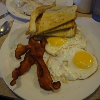 Doug's Place - My eggs and bacon. My side of biscuits and gravy in the background. - Breakfast & Brunch Near Me - Castro Valley, California Doug's Place - My eggs and bacon. My side of biscuits and gravy in the background. - Breakfast & Brunch Near Me - Castro Valley, California