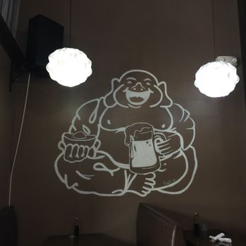 LEVEL Restaurant & Bar - The cute wall art holding a beer mug - Asian Fusion Near Me - Richmond, Virginia LEVEL Restaurant & Bar - The cute wall art holding a beer mug - Asian Fusion Near Me - Richmond, Virginia
