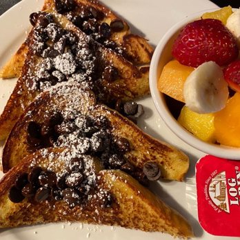 Symposium Cafe Restaurant - Early Bird French Toast, Chocolate Chips & Fruit Cup - Breakfast & Brunch Near Me - Stoney Creek, Ontario Symposium Cafe Restaurant - Early Bird French Toast, Chocolate Chips & Fruit Cup - Breakfast & Brunch Near Me - Stoney Creek, Ontario