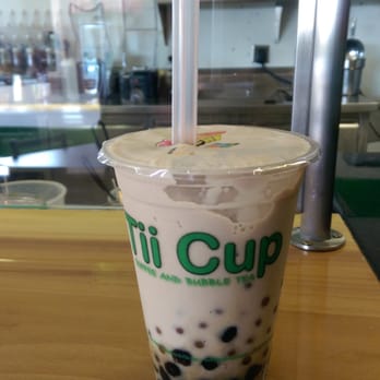 Tii Cup - Golden milk tea snow with regular boba and popping mango boba - Coffee & Tea Near Me - Brooklyn Park, Minnesota Tii Cup - Golden milk tea snow with regular boba and popping mango boba - Coffee & Tea Near Me - Brooklyn Park, Minnesota