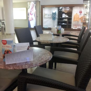 Neuhaus Chocolatier - Seating in the mall. - Desserts Near Me - Vienna, 9