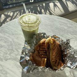 Perks Coffee Shop & Cafe - The ultimate breakfast sandwich and a matcha from Perks enjoyed at the beautiful Hotel Vela.