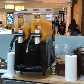 Mango Biche Mia - two juice dispensers on a counter - Food Stands Near Me - Atlanta, Georgia Mango Biche Mia - two juice dispensers on a counter - Food Stands Near Me - Atlanta, Georgia