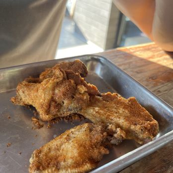 Toss Pizzeria & Pub - The remaining wings - Pizza Near Me - Austin, Texas Toss Pizzeria & Pub - The remaining wings - Pizza Near Me - Austin, Texas