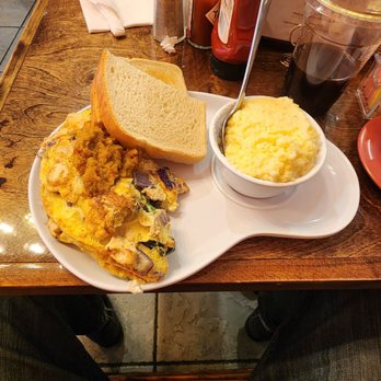 Two Chicks Cafe - The grub.. Chicken omelet, grits, toast..simple simply good - Breakfast & Brunch Near Me - New Orleans, Louisiana Two Chicks Cafe - The grub.. Chicken omelet, grits, toast..simple simply good - Breakfast & Brunch Near Me - New Orleans, Louisiana