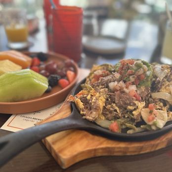 Tinta - Machaca Skillet with fruit platter - Breakfast & Brunch Near Me - Fort Lauderdale, Florida Tinta - Machaca Skillet with fruit platter - Breakfast & Brunch Near Me - Fort Lauderdale, Florida
