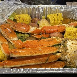 a lb of steamed crab legs with potato, Potato, Corn, and Broccoli (16 oz)