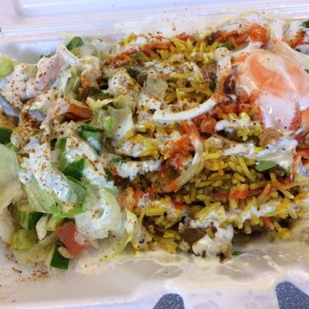 Biryani House Cart - Chicken biryani. It's ok. I think the white sauce and hot sauce made the difference - Indian Near Me - New York, New York Biryani House Cart - Chicken biryani. It's ok. I think the white sauce and hot sauce made the difference - Indian Near Me - New York, New York
