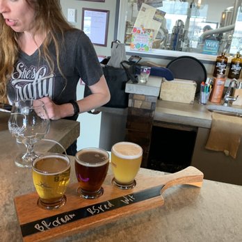 Dawson Trail Craft Brewery - a woman pouring beer - Breweries Near Me - Thunder Bay, Ontario Dawson Trail Craft Brewery - a woman pouring beer - Breweries Near Me - Thunder Bay, Ontario