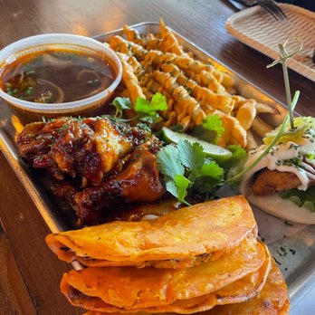 Cris and John - Week 4 Combo - Birria Tacos w Spicy Pho Broth, Sweet Chili Wings, Cheese Fries - Vietnamese Near Me - Dallas, Texas Cris and John - Week 4 Combo - Birria Tacos w Spicy Pho Broth, Sweet Chili Wings, Cheese Fries - Vietnamese Near Me - Dallas, Texas
