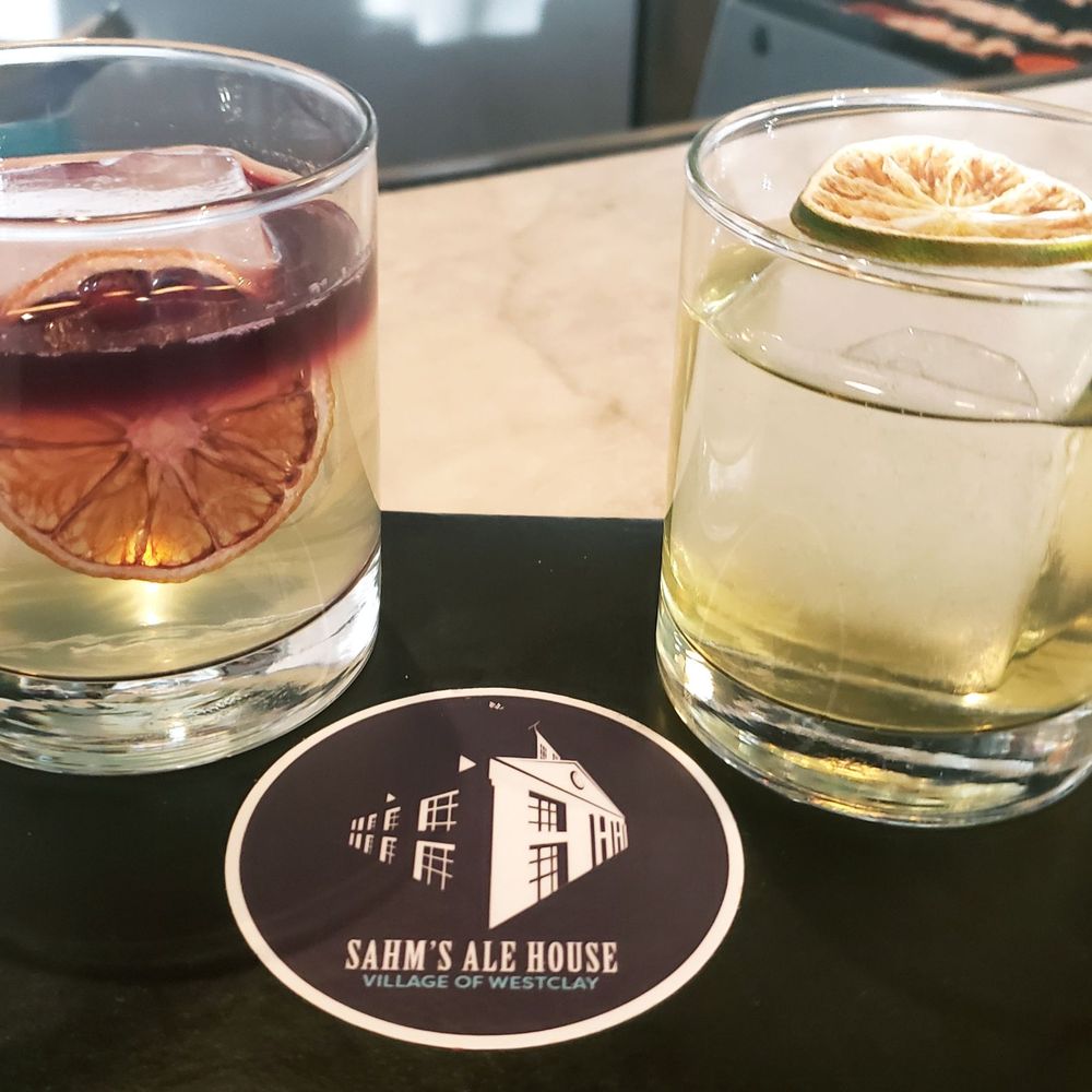 Sahm's Ale House - New York sour milk punch on left and Negroni daiquiri milk punch on right. - American Near Me - Carmel, Indiana Sahm's Ale House - New York sour milk punch on left and Negroni daiquiri milk punch on right. - American Near Me - Carmel, Indiana