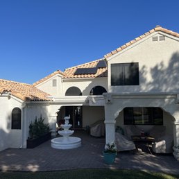 Screens on the back of our house included arches and regular windows.