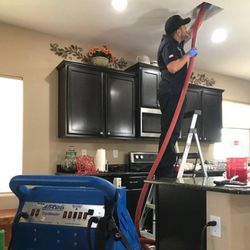 CleanFlow Pros - Air duct cleaning Service  process at customers house by Clean Flow Pros technician