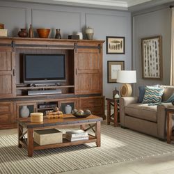 Vintage Oak Furniture - Entertainment wall units and TV stands on display.