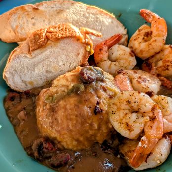 Sunset Grille - Shrimp and Grits with Crawfish Etouffeé Sauce. Sautéed Bread (Fried, Grilled, or Blackened) - Seafood Near Me - Pensacola, Florida Sunset Grille - Shrimp and Grits with Crawfish Etouffeé Sauce. Sautéed Bread (Fried, Grilled, or Blackened) - Seafood Near Me - Pensacola, Florida