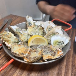 The Atlantic - Oysters Chesapeake, garlic butter oysters, and oysters rockafellar