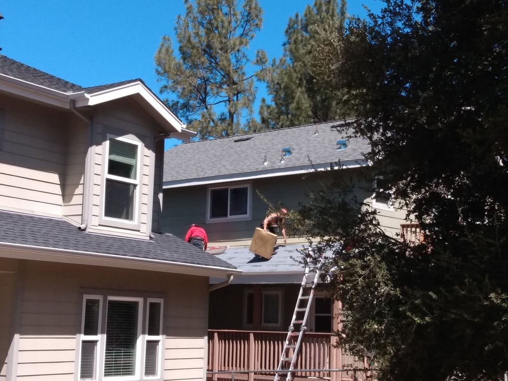 Slide of Outlaw Roofing