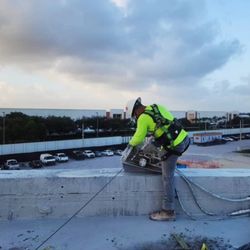Pro Cut Concrete Cutting - Hand sawing a parapet wall at The Concours Club, Miami