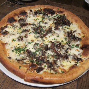 Siena Tavern - Truffle Mushroom Pizza - Roasted Wild Mushrooms, Garlic Cream, Mozzarella, White Truffle Oil - Italian Near Me - Chicago, Illinois Siena Tavern - Truffle Mushroom Pizza - Roasted Wild Mushrooms, Garlic Cream, Mozzarella, White Truffle Oil - Italian Near Me - Chicago, Illinois