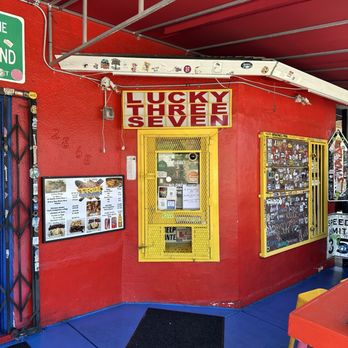 Lucky Three Seven - Speak your order through the yellow window. Pay and receive your food via the open box on the bottom. - Filipino Near Me - Oakland, California