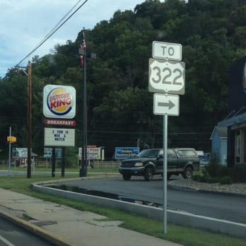Burger King - a car driving down the road - Burgers Near Me - Burnham, Pennsylvania