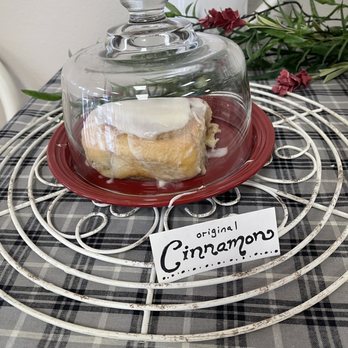 Grandma Ruth's Cinnamon Rolls - A reel roll example under glass - Bakeries Near Me - Branson, Missouri Grandma Ruth's Cinnamon Rolls - A reel roll example under glass - Bakeries Near Me - Branson, Missouri