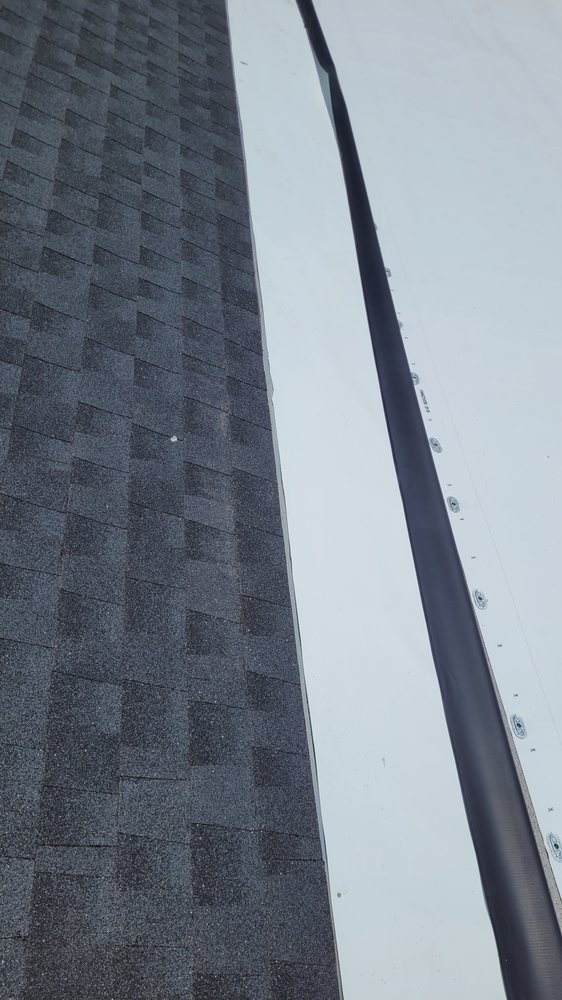 Slide of LTZ Roofing Pros