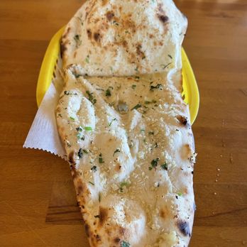 Village Tandoor - North Indian restaurant - Buffet - Garlic Naan, $1.50 extra - Indian Near Me - Northridge, California Village Tandoor - North Indian restaurant - Buffet - Garlic Naan, $1.50 extra - Indian Near Me - Northridge, California