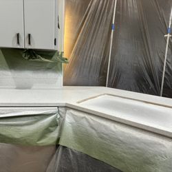 Miracle Method Surface Refinishing - The tech made a tent wall to protect dust from entering the rest of the house.  Cabinets were all covered.