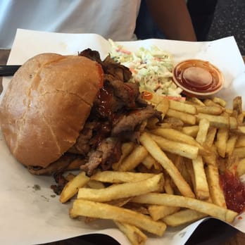 Phil's BBQ - El Toro with cole slaw and fries with delicious BBQ sauce on the side - Barbeque Near Me - San Diego, California Phil's BBQ - El Toro with cole slaw and fries with delicious BBQ sauce on the side - Barbeque Near Me - San Diego, California