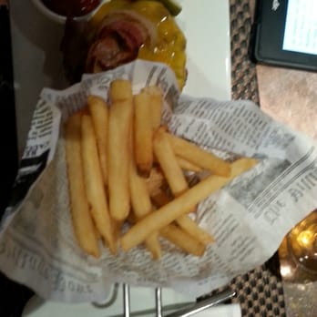 Banc Cafe - French Fries atop Newspaper - Cafes Near Me - New York, New York Banc Cafe - French Fries atop Newspaper - Cafes Near Me - New York, New York