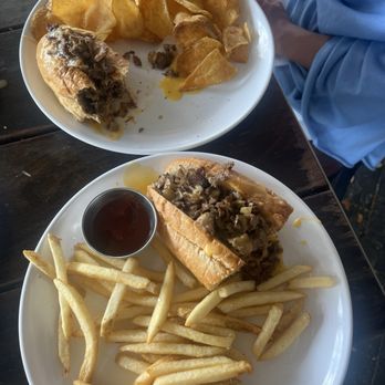 Berkeley’s - Cheesesteak with fries and house chips - Bars Near Me - Charleston, South Carolina