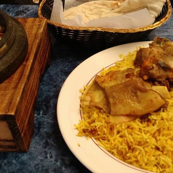 Al-Rayan Restaurant - On the left is "Hafsah" eaten with bread, and right is Mandi Laham, which is lamb meat with Arabic rice :) - Halal Near Me - Indianapolis, Indiana