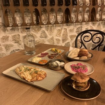 AMBAR Restaurant, Capitol Hill - White Flatbread, mozzarella slider, bread, beef and lamb prosciutto, Beet Tzatziki - Modern European Near Me - Washington, DC, District of Columbia