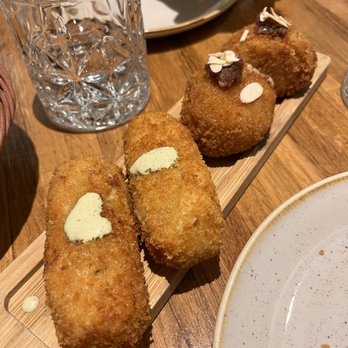 Desengaño 13 - Croquetas (dates on the right and jamon on the left) - Spanish Near Me - Madrid, M Desengaño 13 - Croquetas (dates on the right and jamon on the left) - Spanish Near Me - Madrid, M