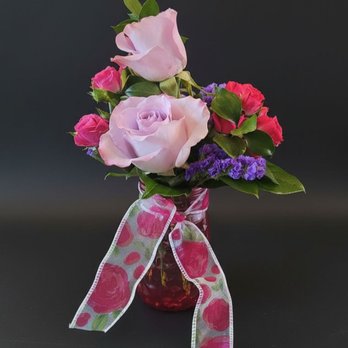 Foley's Florist & Gifts - Lavender roses, pink spray roses, purple statis, in a pink mason jar with a bow - Florists Near Me - Berea, Kentucky
